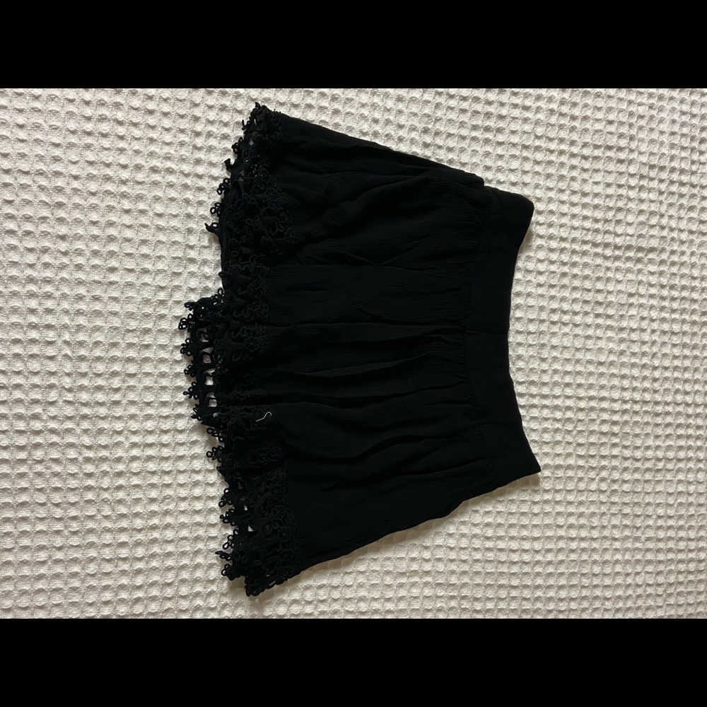 Fun black skirt with lace lining.